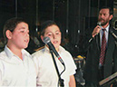 Chazan Braun and peforming with his sons